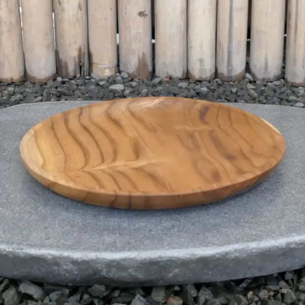 Product image 1 of the product “Wooden plate, made of teak wood, 25 cm dia. ”